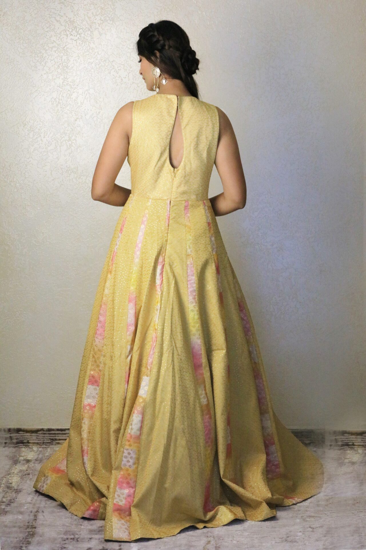 light yellow with v neckline full flare gown