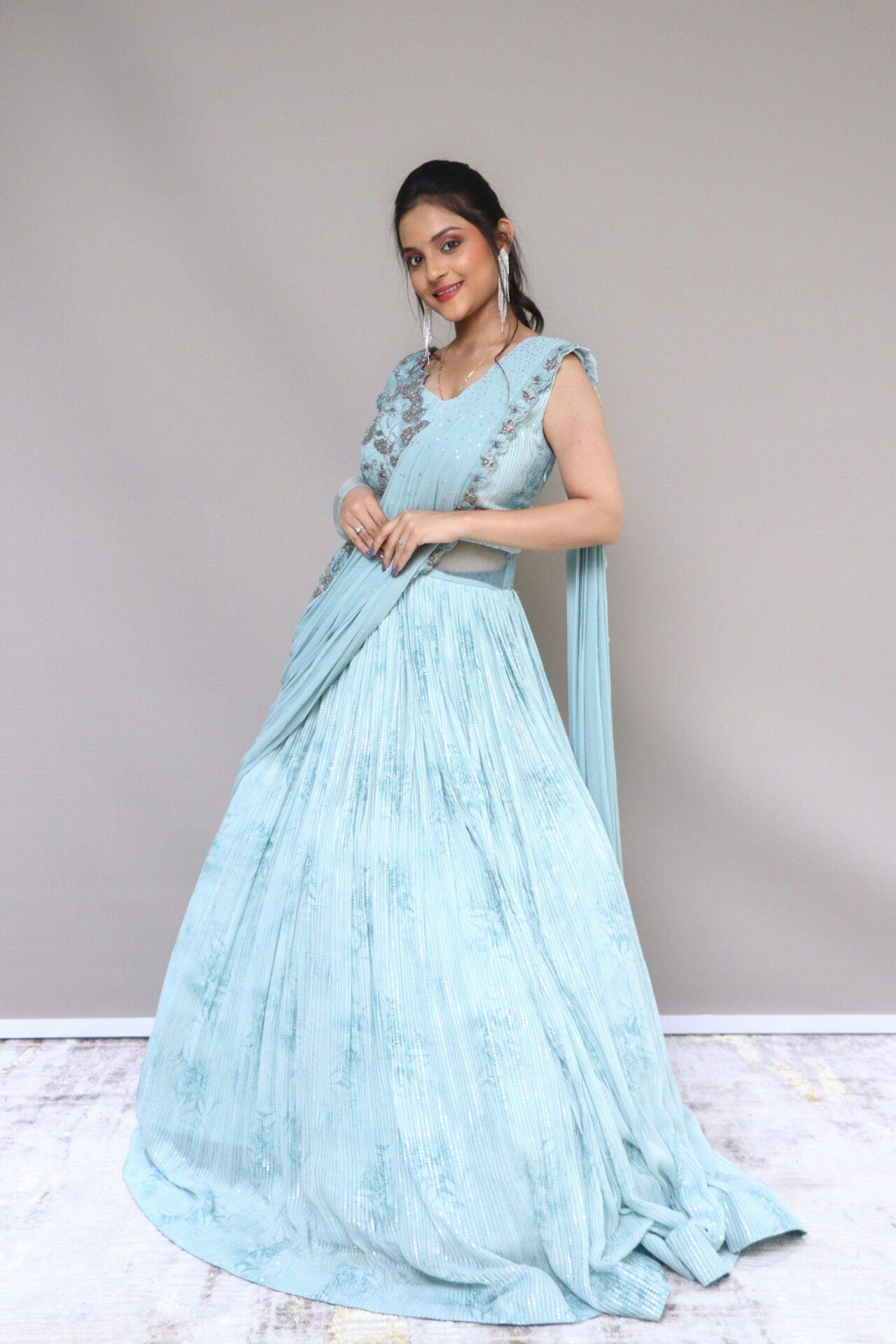 Sky blue printed gown with drape