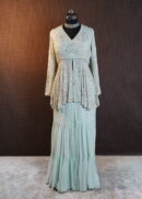 Mint green peplum top with flared palazzo