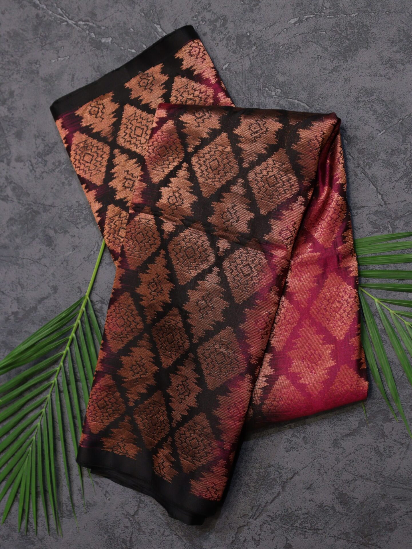 Rani Pink and Black vertical shaded borderless Kanjivaram Saree