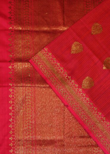 Khadi silk saree in hot pink with copper zari butis and zari border with running blouse.