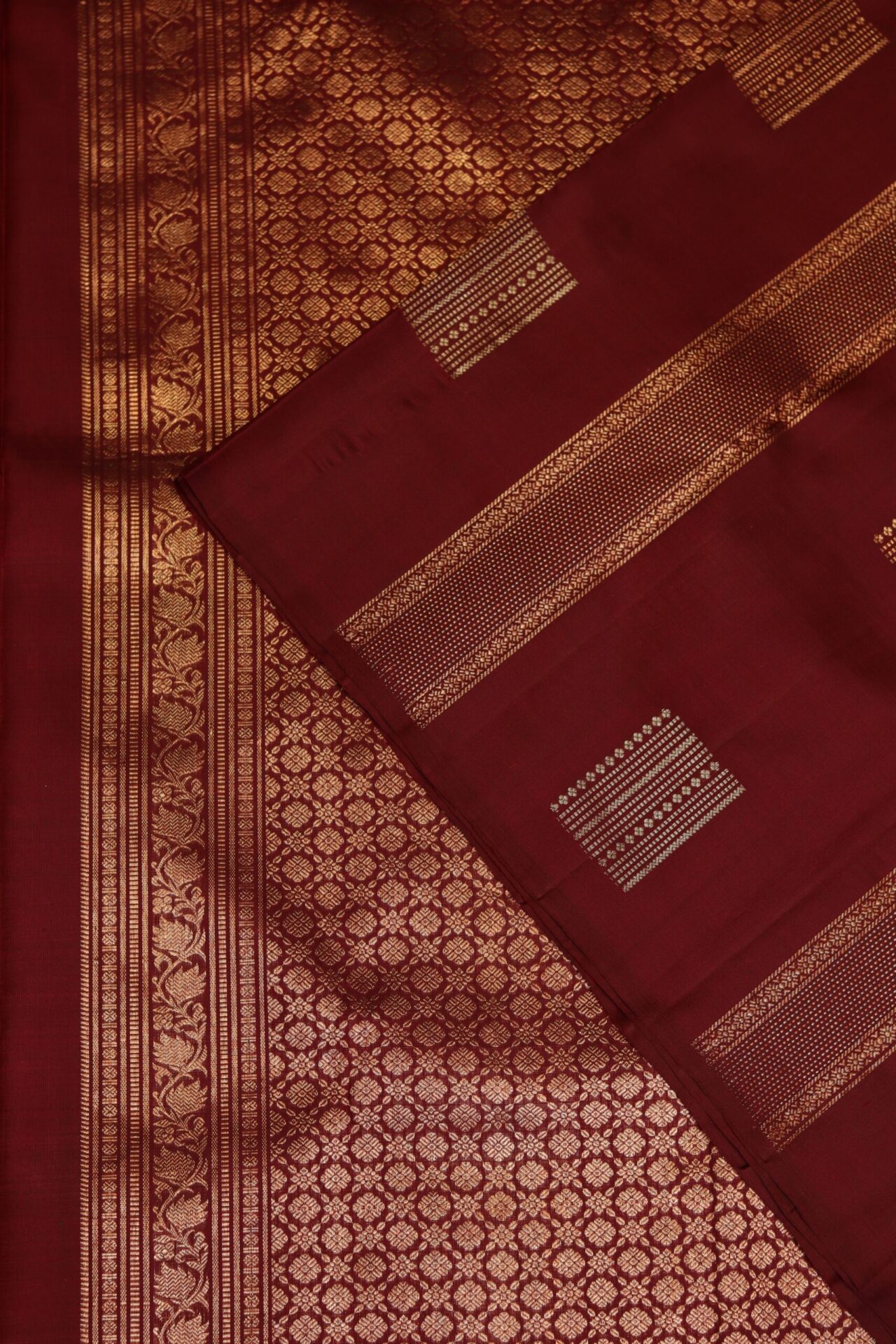 Wine maroon kanjeevaram, borderlles saree, zari geometric pattern on saree