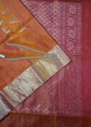 Soft silk saree with zari weaving in geometric design. Colour- mustard gold with maroon pallu.
